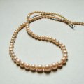 "Cream" glass pearl strand