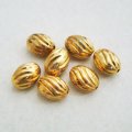 2pcs "Gold" 13x9 twist oval beads