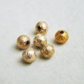 brass 7.5mm floral design beads